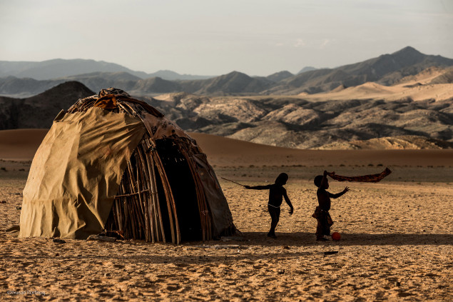 Himba toddlers in their village near Serra Cafema Camp, Namibia.